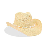 Woman wearing straw cowboy hat with shapeable brim