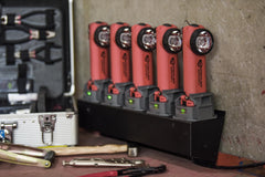 Streamlight Survivor X with LED indicators showing per-battery status.