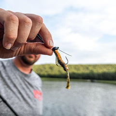Strike King Ned Rig head on weed-filled water for weed resistance and stand-up action.