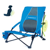 STRONGBACK Low Gravity Beach Chair in blue with lumbar support on sand.