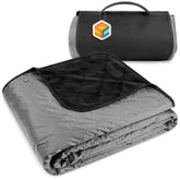 SUN CUBE blanket folded compact for travel and storage.