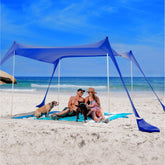 SUN NINJA beach tent pop-up in action providing quick shade.