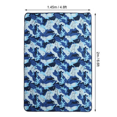 SUNGOOYUE PVC beach blanket on sand, sand-proof and quick-dry for seaside fun.
