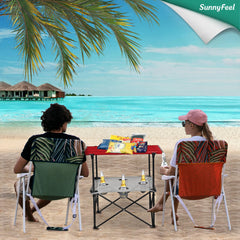 Sunnyfeel folding camping table at the beach ready for drinks and snacks.