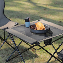 SunnyFeel Outdoor Folding Table mesh storage net holds drinks and snacks.