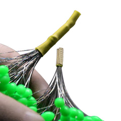 Threading the silicone bobber stop onto a line