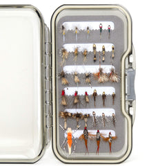 Close-up of the Superbe Flies box showing premium hooks and diverse trout patterns