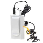 Superdental headlamp clip attaches to loupes for hands-free illumination.