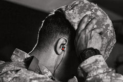 EP4 earplugs worn with a helmet or mask for a low-profile fit