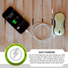 Survival Frog QuickHeat PRO in-use hands warming during chilly commute.