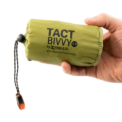 Survival Frog Tact Bivvy HeatEcho compact sleeping bag in pack sleeve for quick access.