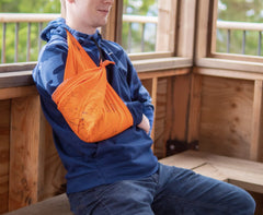 Tacticouture orange map bandana shows magnetic North and mileage scales for orientation.