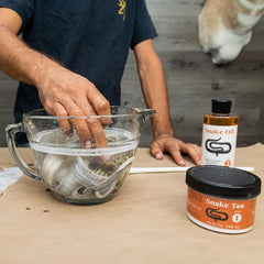 Tan-a-Snake Kit salting stage shows even preservation for vibrant skins.