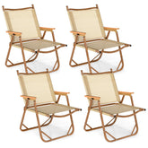 Tangkula camping chairs four-set folded for easy transport and storage.