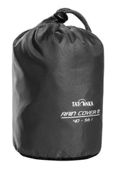 Tatonka rain cover folded inside the pack bag for easy storage.