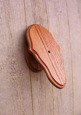 The Taxidermists Woodshop face plate shows solid oak craftsmanship for durable trophy display.
