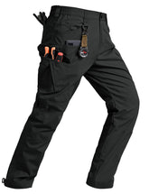 TBMPOY men's tactical pants with 10 pockets for organized gear during outdoor activities.
