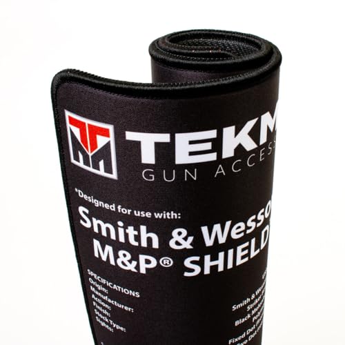 Rolled-up Tekmat handgun cleaning mat for easy storage