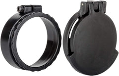 Tenebraex ocular flip-up scope cover protecting optics in rugged field use.