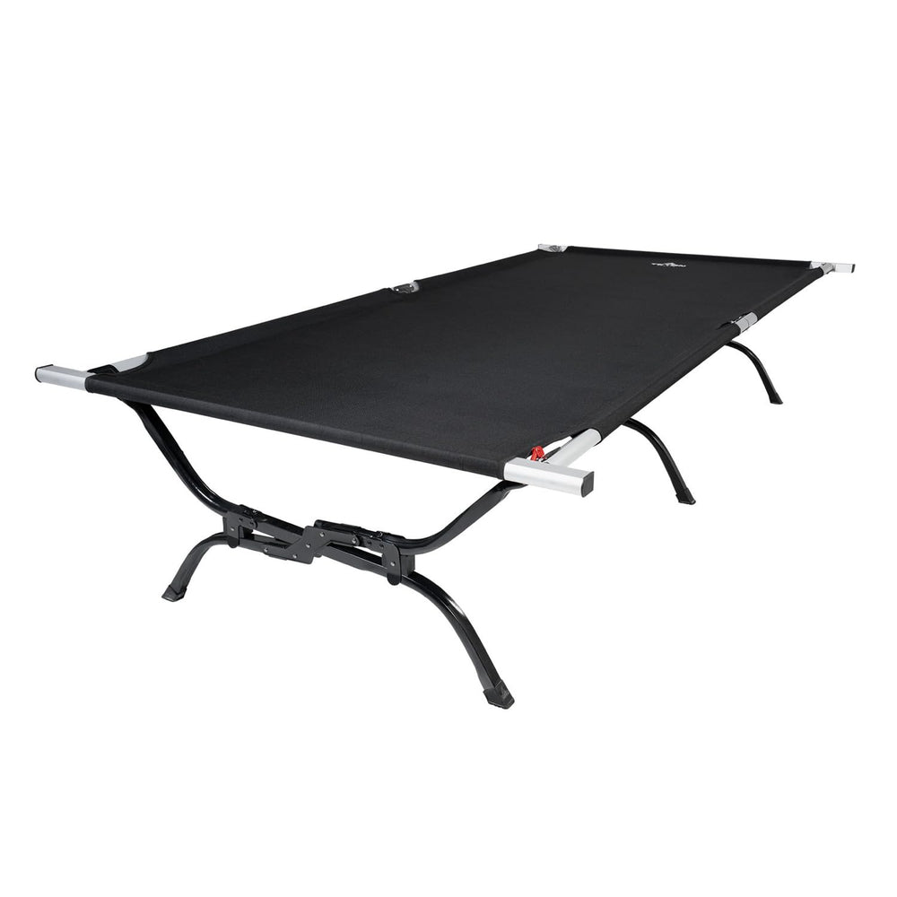 TETON Sports Outfitter camping cot with pivot arm for quick setup.