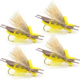 The Fly Fishing Place Guerilla Hopper on water, yellow high-visibility grasshopper dry fly for surface fishing.