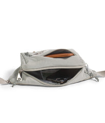 The North Face Berkeley Lumbar Bag external pocket secures sunglasses and chapstick within reach