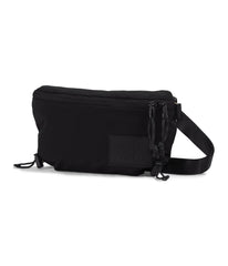 The North Face Never Stop Lumbar front view highlights compact city carry.