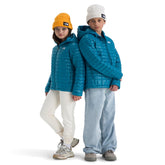 The North Face Teen Thermoball Hooded Jacket front view, 3-piece hood for adaptable warmth.