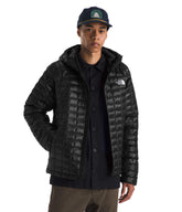 The North Face Thermoball Hooded Jacket fabric closeup highlights lightweight insulation for cold days