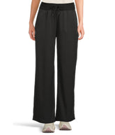 The North Face Aphrodite Arise Wide Leg Pant front view shows sleek fit and mobility