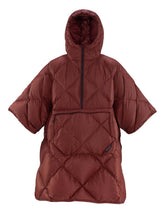 Therm-a-Rest Honcho Poncho Down worn hooded at camp for lightweight warmth