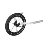 Thule Chariot jogging kit installation demonstrates quick setup with secure fit.