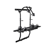 Thule Elite Van XT bike rack mounted to rear doors for secure transport.