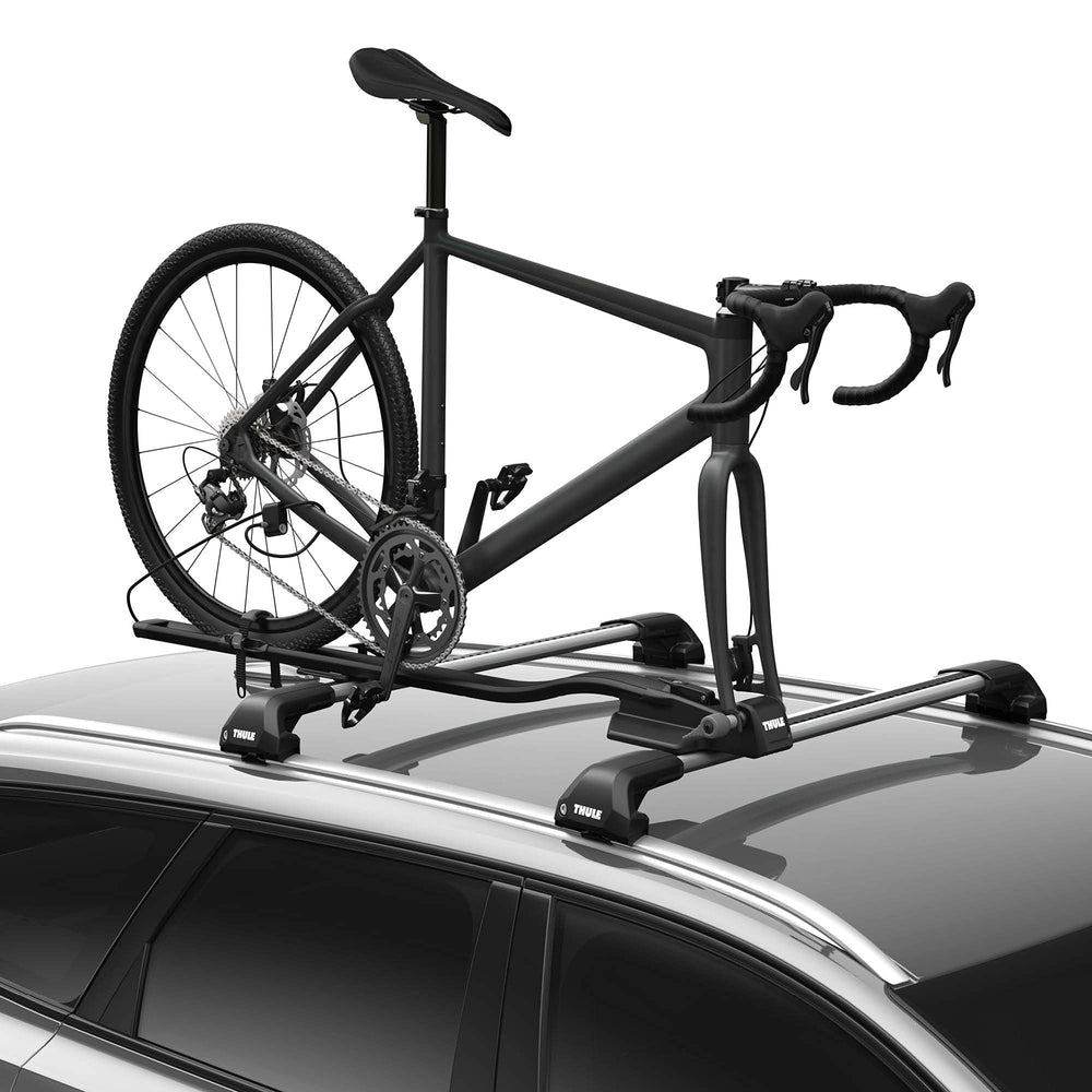 Thule FastRide quick-release fit shows easy, secure rooftop mounting