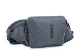 Thule Rail Hip Pack front view with one-handed phone access for quick rides.