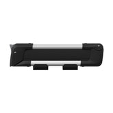 Thule SnowPack mounted on car roof securely holding skis for transport.