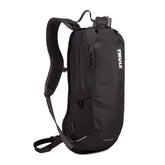 Thule Uptake 8L front view showing organized pockets for quick trail access
