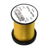 TIEMCO Spyder Thread Yellow spool shown, highlighting ultra-thin strength for micro fly tying.