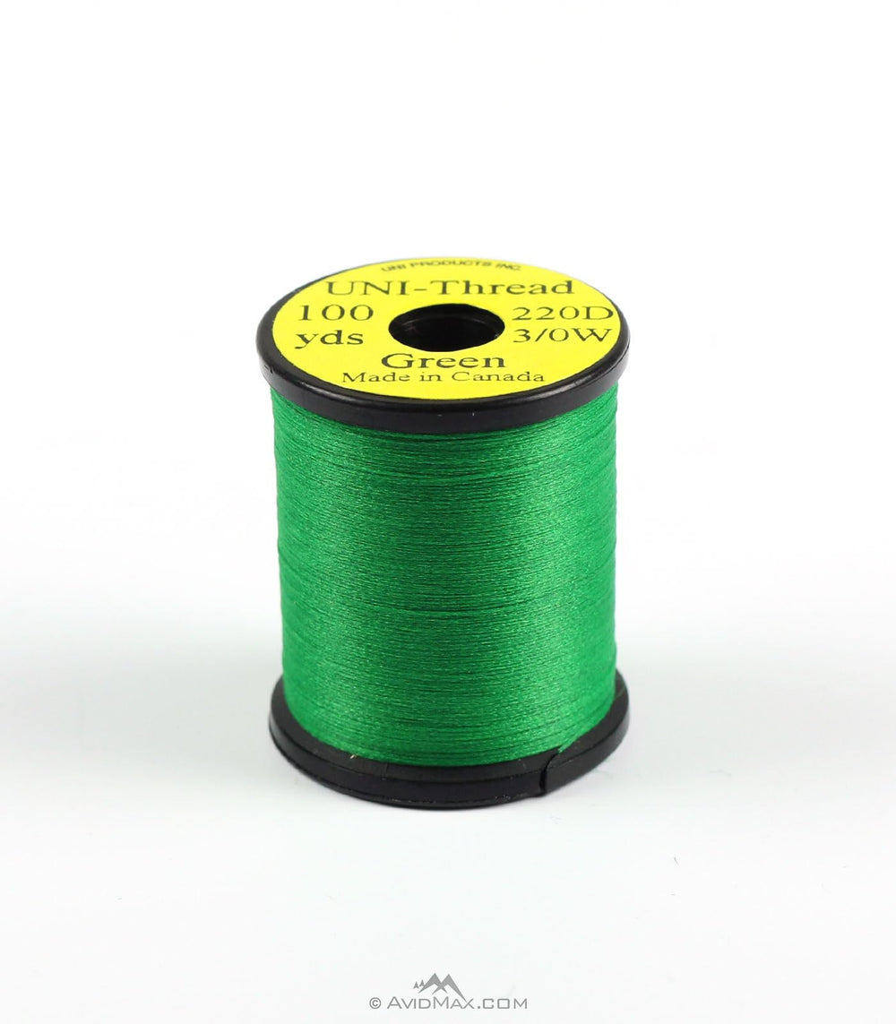 TIEMCO UNI 3/0 waxed thread on a green spool for durable fly tying