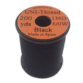 TIEMCO UNI-Thread 6/0 black spool showing durable wraps for dry flies.