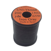 TIEMCO UNI Thread 6-0 iron gray close-up shows smooth wraps for standard flies