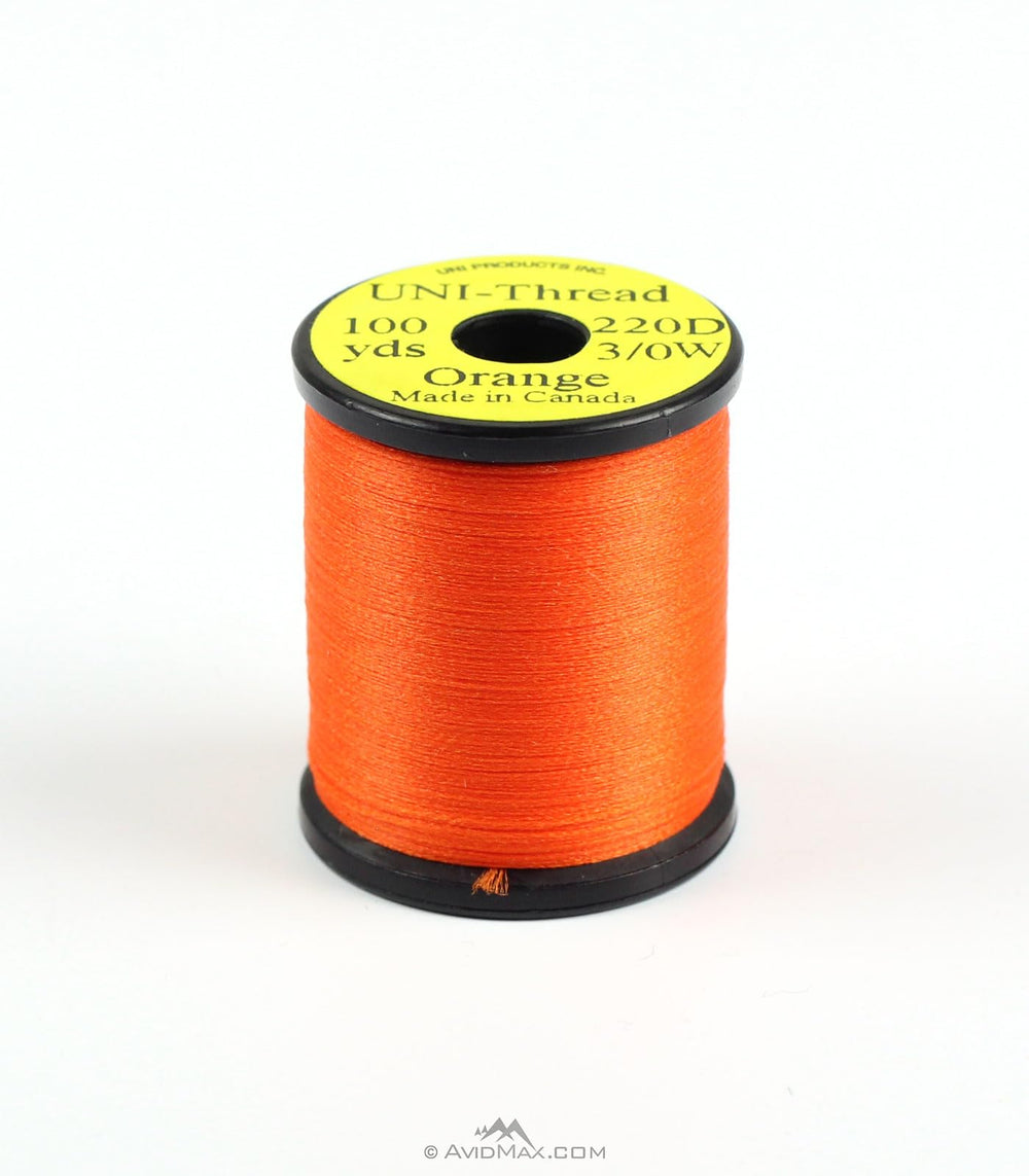 TIEMCO UNI-Thread Waxed 3/0 orange spool for durable fly tying that lies flat