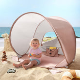 Tiny Land Baby Beach Tent pops up in seconds for easy beach shade