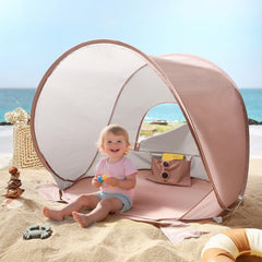 Tiny Land Baby Beach Tent pops up in seconds for easy beach shade