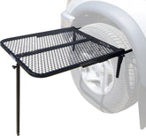Tire Table attached to a vehicle tire creates a stable outdoor surface.