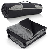 Tirrinia waterproof outdoor blanket backside—wind and water resistance for all-weather use.