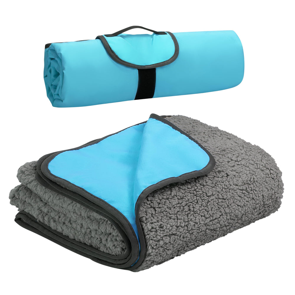 Tirrinia foldable waterproof outdoor blanket rolled for travel and storage.