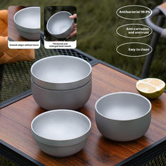 Titanium Bowl compact stackable design beside cookware for space-saving camping