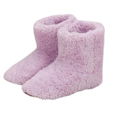 TKOWTB USB heated foot shoe in pink, close-up highlighting cozy warmth.