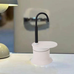 Tnfeeon aluminum alloy coffee maker combines durability with lightweight portability.